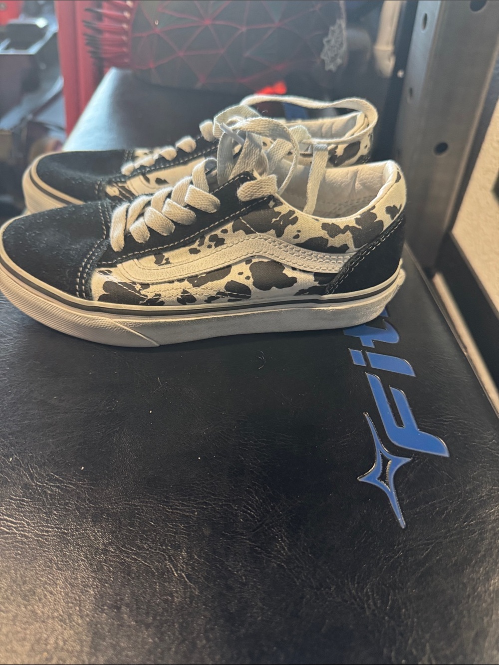 Vans Kids Low-Top Sneakers in Black and White Cow Print